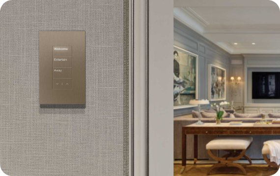 Wall-mounted home controls beside a living room